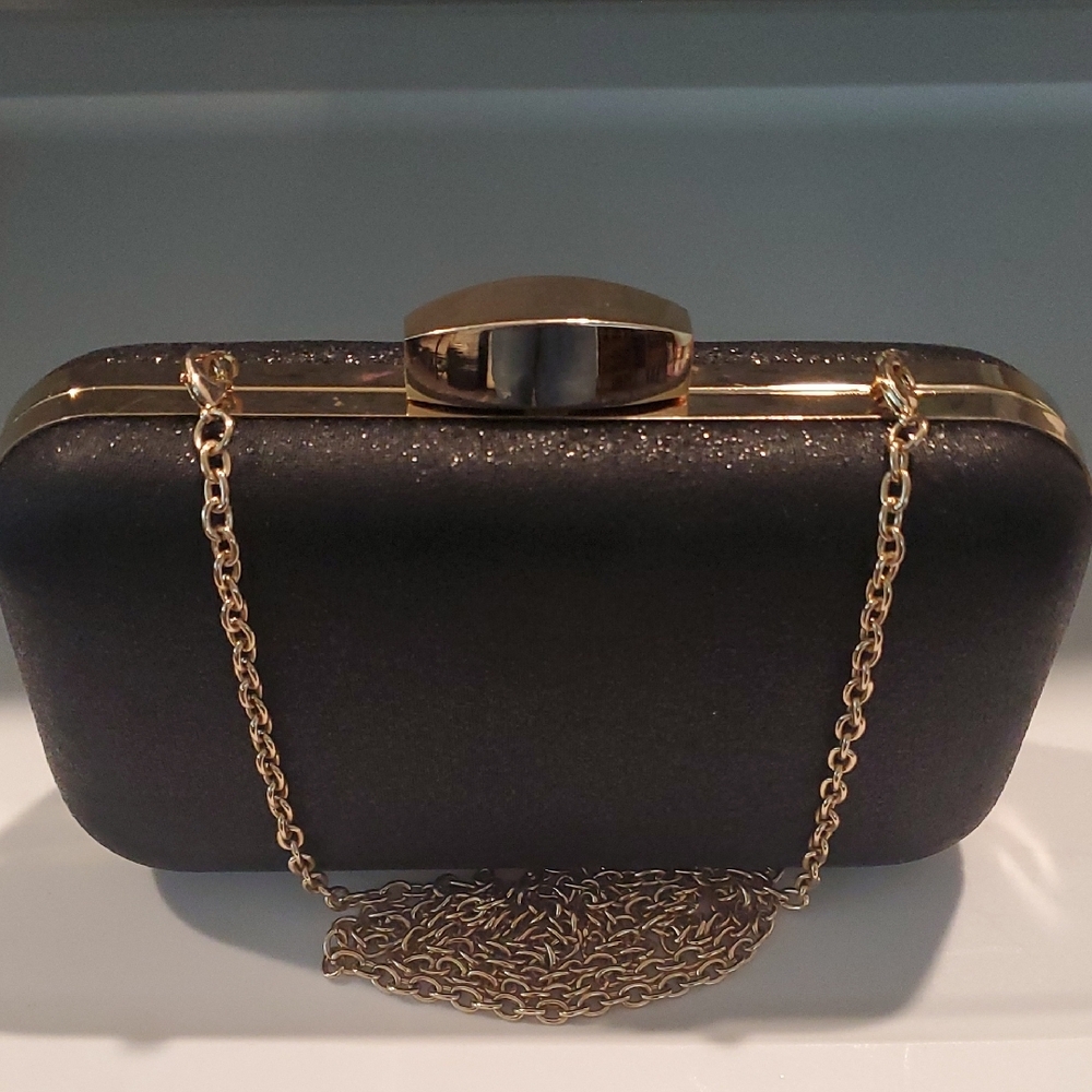 Guess Black And Gold Structured Clutch!